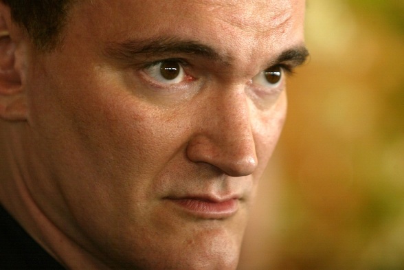 CANNES, FRANCE - MAY 18: Director Quentin Tarantino receives the "Office Arts and Letters" award during the 57th International Cannes Film Festival May 18, 2004 in Cannes, France. (Photo by Carlo Allegri/Getty Images)